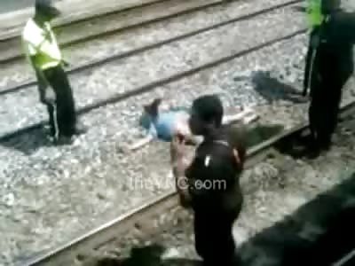 Kid Broken Back and Barely Alive after Trying to Beat a Train and Run across the Platform