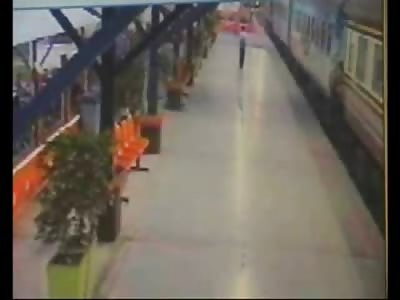 Grisly Death: Man trying to Get off of Train is Sucked Underneath as his Bag gets Caught in the Wheels