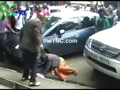 Black Man beats his Wife in a Parking Lot as Everyone just Watches and some even Laugh