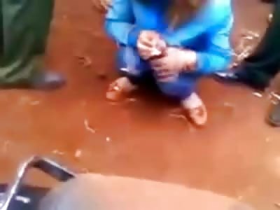 Scared Cowering Girl in Handcuffs is Beaten by Mob and has her Motorcycle Smashed