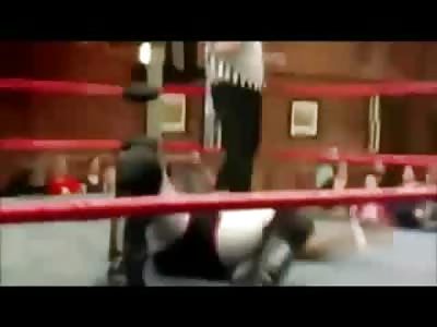 Wrestler jumping from the Top Rope Breaks his Neck....then is Pinned Twice by his Opponent