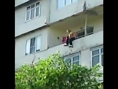 Suicidal Man ends his Life from his Balcony as he Dangles and finally Goes