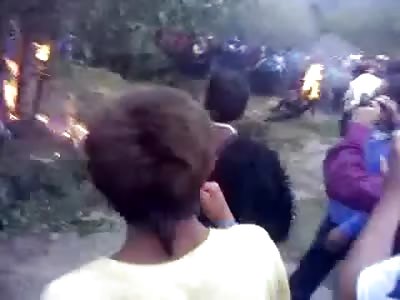 3 Rapists Burn Alive as Crowd Hoots and Hollers and Records with their Cell Phones