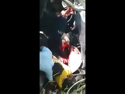 Screaming Boy stuck in Back Seat with his Dead Parents in the Front Seat..Fathers Head is Exploded