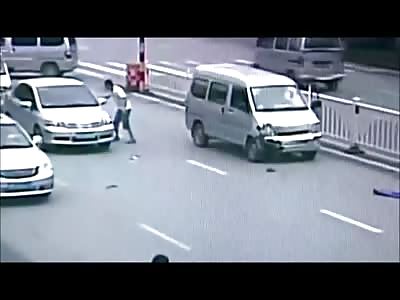 Incredible Video Shows a Man and his Child Struck by a Van ..... The Little Kid Gets Stuck under Van When Onlookers Rush into Action Lifting the Van off of Him