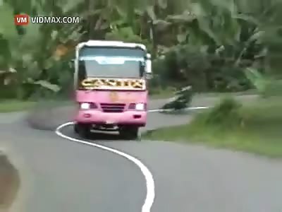 Head on collision with two motorcycles, trying to pass a bus